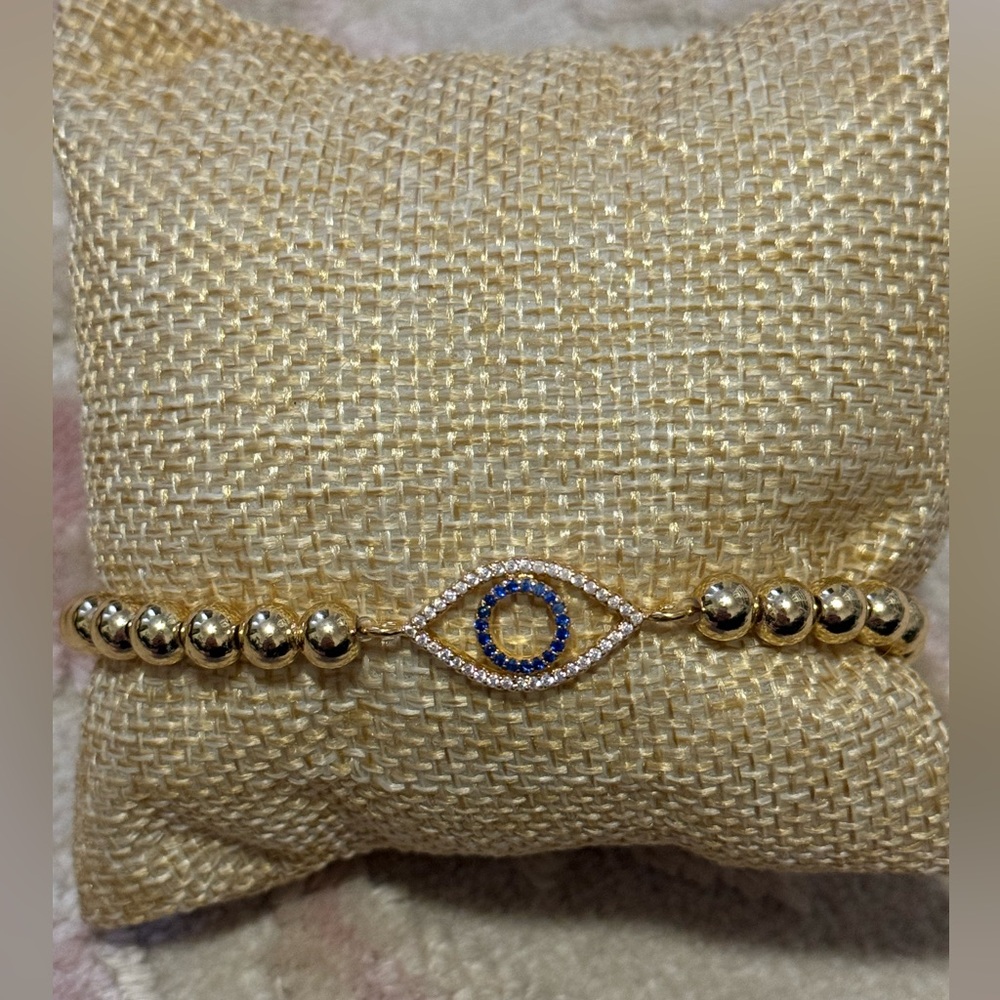 Evil eye stainless steel goldtone pave bracelet